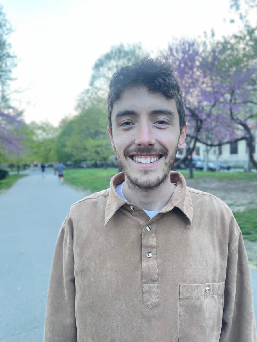 Aaron Brown smiling outdoors
